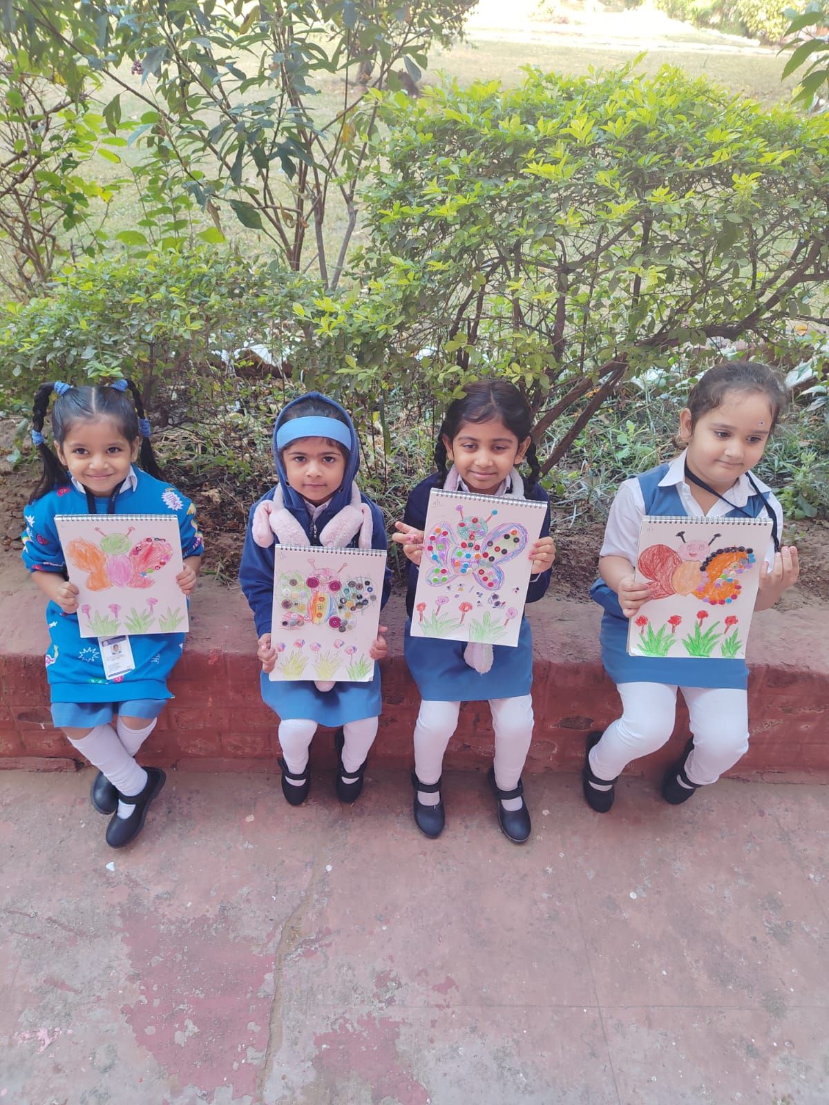 Butterfly Making and Crafting their own Aprons